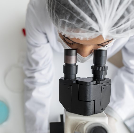 close-up-researcher-looking-through-ocular-lens